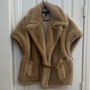 GORGEOUS FAUX FUR JACKET NWT. SHORT SLEEVE TURN UP COLLAR BELTED IF WANTED.